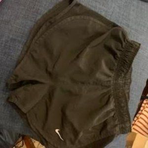 Nike Women's athletic shorts, black, size XS, dri-fit material